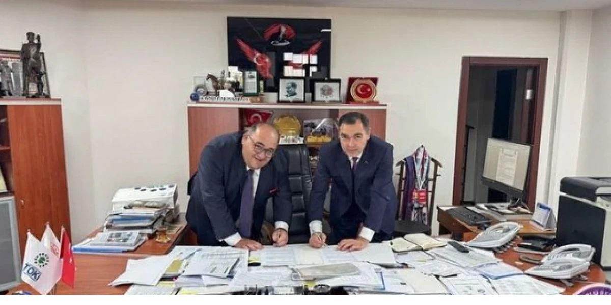 Ke&ccedil;iborlu TOKİ&rsquo;de imzalar atıldı